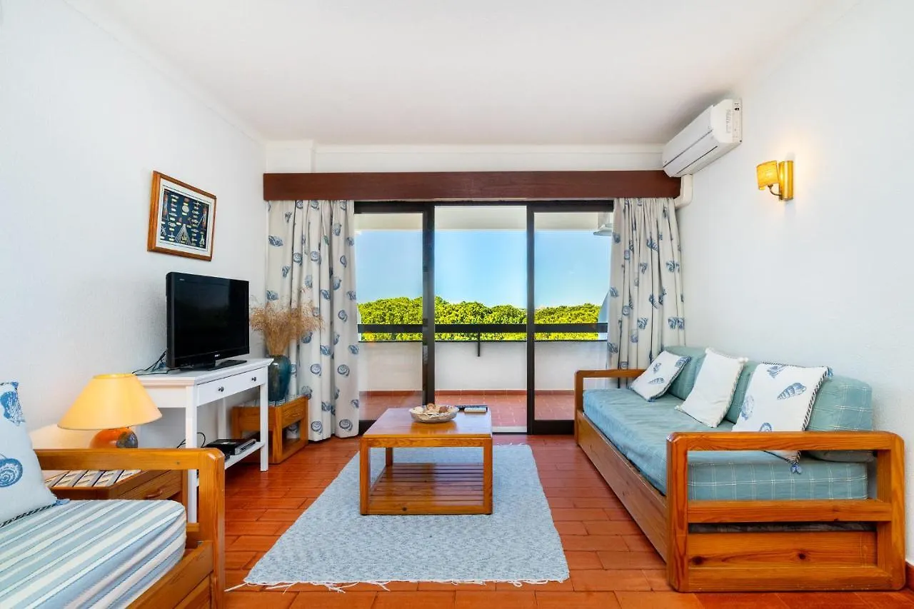 Whome | Vilamoura Sunny Apartment Quarteira Portugal